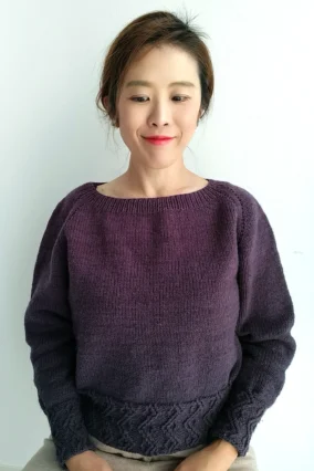 Designer Mamet Knit is wearing Lattice sweater